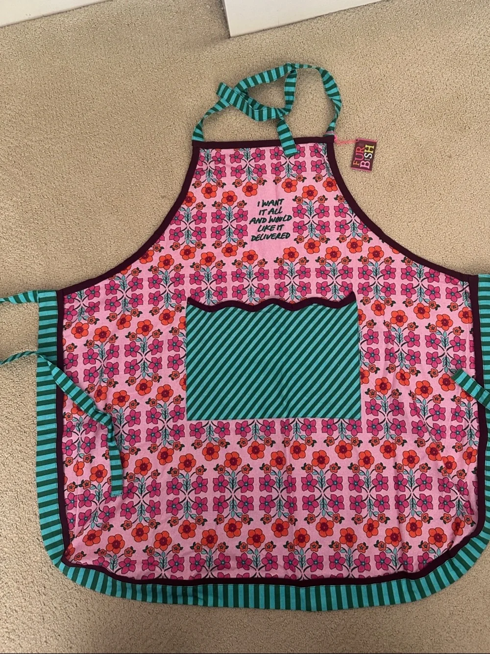 Whimsical Pink Floral Apron with Teal Striped Pocket